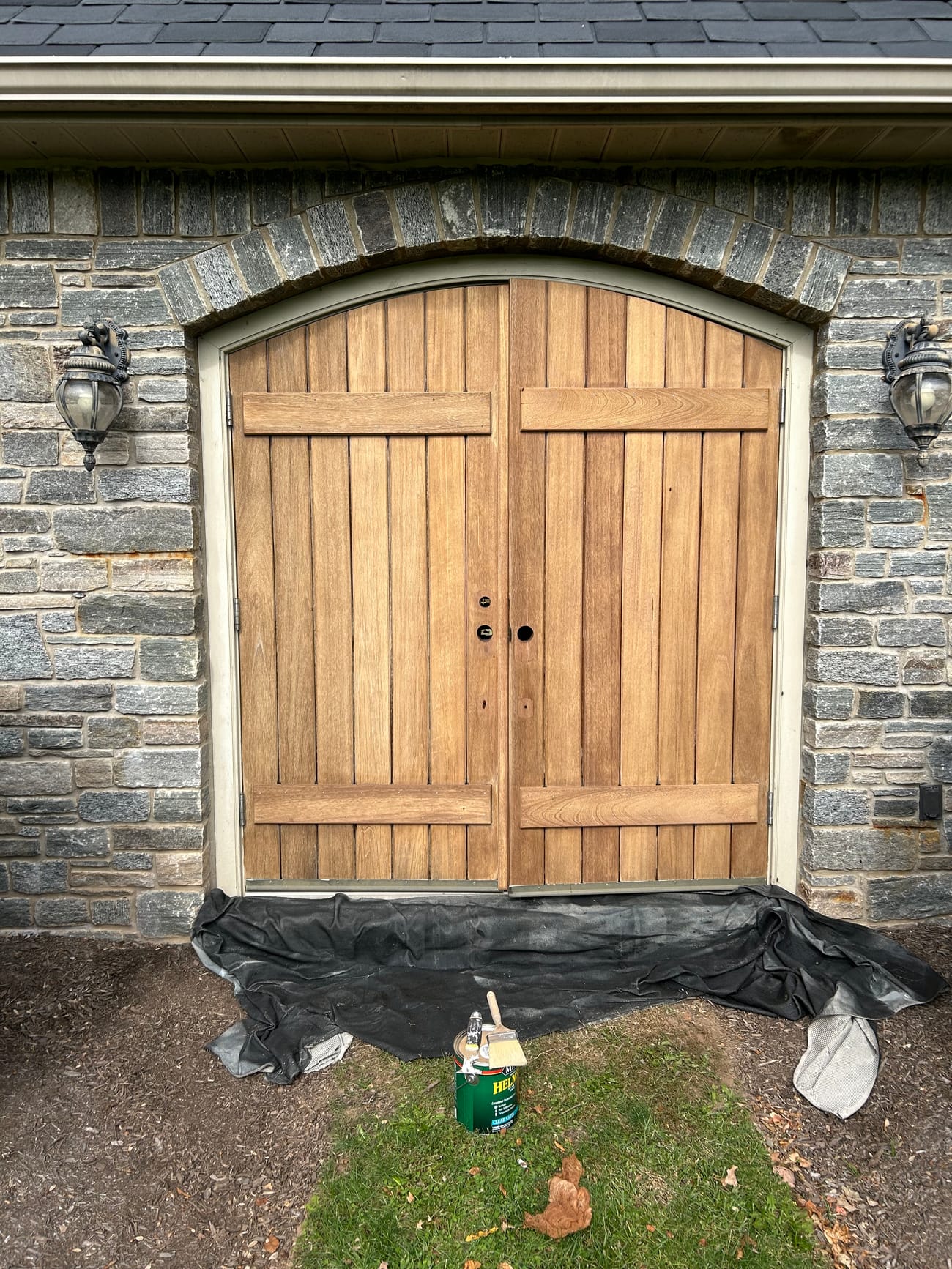 Pumphouse doors sanded down before staining