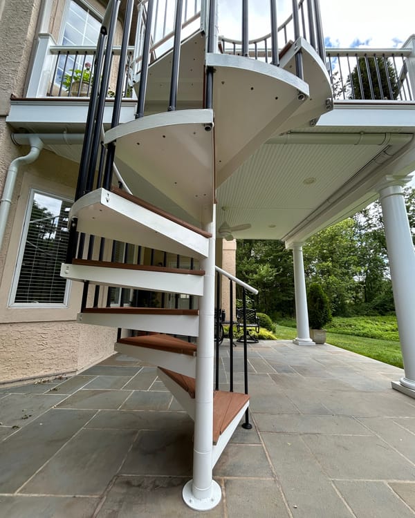 The same spiral staircase painted white