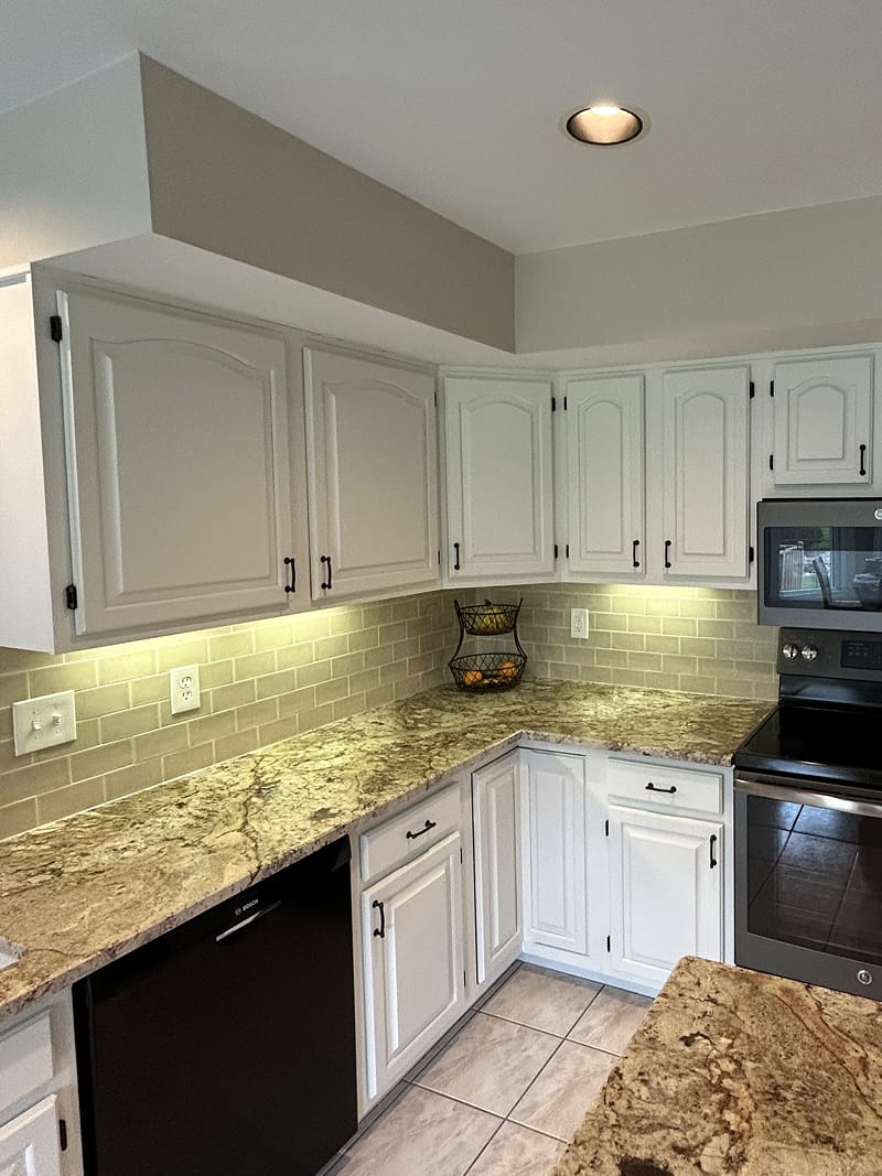 beige cabinets before staining — weathered and faded finish