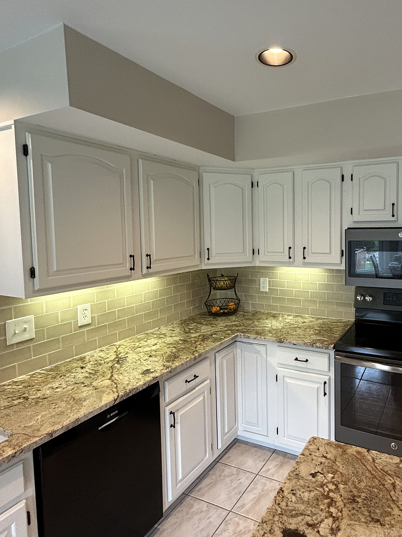 beige cabinets before staining — weathered and faded finish